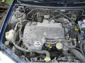 imagine dezmembrez-Mazda-323F-avariat-4362.htm