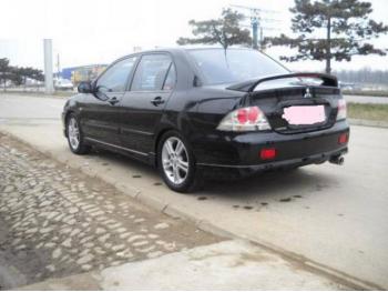 dezmembrez-Mitsubishi-Lancer-avariat-15023.htm imagine dezmembrez-Mitsubishi-Lancer-avariat-15023.htm